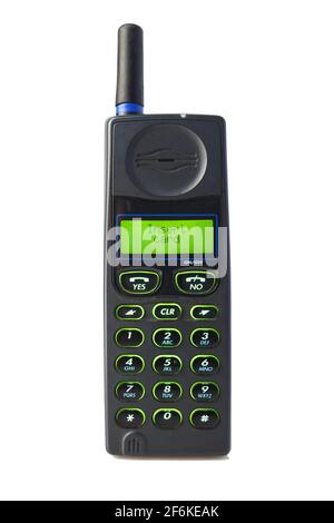 Old used cell phone, isolated white background Stock Photo