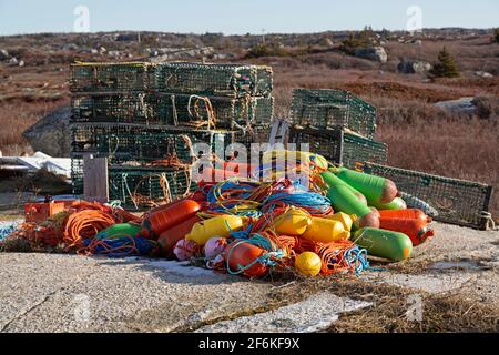 Fishing nets, lobster traps and buoys at Peggys Cove in Nova Scotia, Halifax. Stock Photo