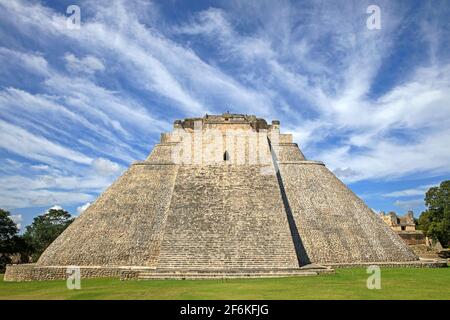 Pyramid of the Magician / Pirámide del adivino, Mesoamerican step pyramid in the ancient Mayan city Uxmal, Yucatán, Mexico Stock Photo