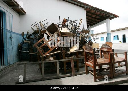 eunapolis, bahia / brazil - february 9, 2011: damaged school furniture is seen in the courtyard in the city of Eunapolis. Stock Photo