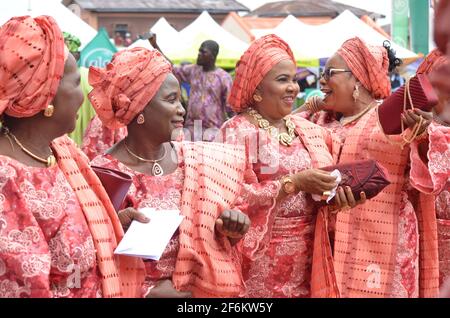 Nigerian women showcasing their traditional attire in paying homage to the traditional ruler of Ijebu Land during the Ojude Oba Festival in Nigeria. Stock Photo