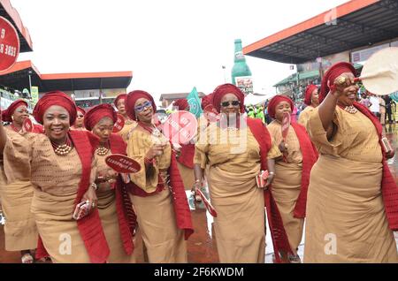 Nigerian women showcasing their traditional attire in paying homage to the traditional ruler of Ijebu Land during the Ojude Oba Festival in Nigeria. Stock Photo