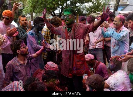 Barpeta, India. 29th Mar, 2021. People celebrate Holi festival at Barpeta Satra Namghar ground, amid COVID-19 coronavirus pandemic, at Barpeta, India. Devotee celebrate with a spontaneous expression of joy by playing with coloured powder and singing Holi songs. Credit: David Talukdar/Alamy Live News Stock Photo