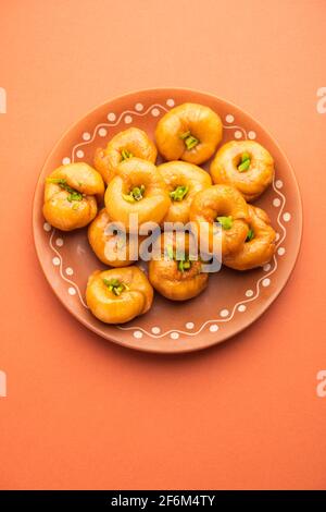 Balushahi or Badushah or Mughlai dish is a traditional Indian soft and flaky dessert  or sweet food also popular in Pakistan and Bangladesh Stock Photo