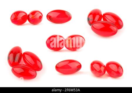 Red vitamin pills closeup isolated on white background Stock Photo