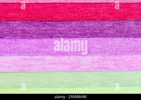 Samples of colored cloth close-up warm shades. Background texture Stock Photo