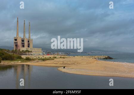 Landscape with an old disused thermal power station for the production of electric energy in Barcelona Spain Stock Photo