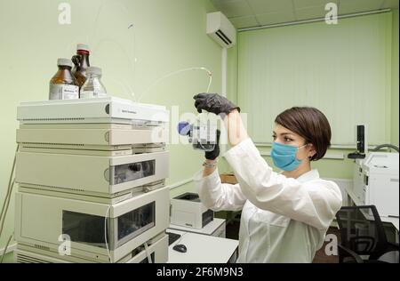 Conducting chemical and biological experiments in the laboratory. Stock Photo