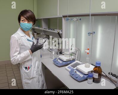 Conducting chemical and biological experiments in the laboratory. Stock Photo