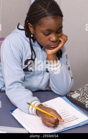 New york City independent elementary school Grade 4 ages 9-10 mathematics girl working on mathematics problems