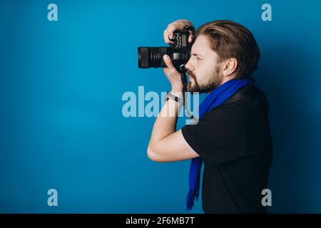 Photographer using camera for picture Stock Photo