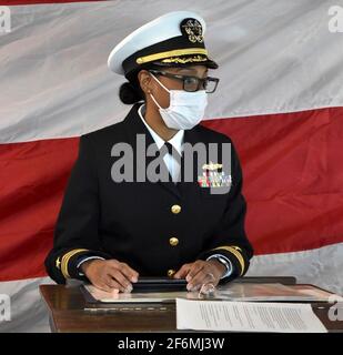 U.S. Navy Cmdr. LaDonna M. Simpson, commanding officer of the Harpers Ferry-class amphibious dock landing ship USS Carter Hall address sailors during a change of command ceremony January 21, 2021 in Virginia Beach, Virginia. Stock Photo