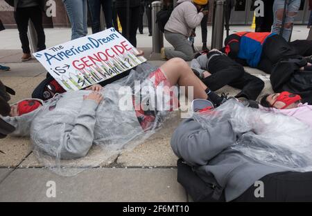 April 1, 2021. Indigenous youth and supporters from the Dakota Access and Line 3 pipeline fights participate in a die-in in front of the Army Corps of Engineers Office, where they held a rally and delivered boxes of petitions, before marching to Black Lives Matter Plaza near the White House, to demand that President Biden revoke the Army Corps permits for Line 3, and shutdown the Dakota Access Pipeline, and to replace the dependence on oil by “Building Back Fossil Free.”