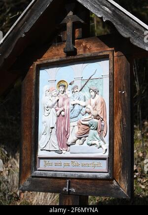 Eschenlohe, Germany. 01st Apr, 2021. The first station on a Way of the Cross up to St. Nicholas on the Vestbichl shows 'Jesus is condemned to death'. Credit: Angelika Warmuth/dpa/Alamy Live News Stock Photo