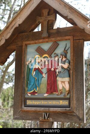 Eschenlohe, Germany. 01st Apr, 2021. The fourth station on a Way of the Cross up to St. Nicholas on the Vestbichl shows 'Jesus meets his afflicted mother'. Credit: Angelika Warmuth/dpa/Alamy Live News Stock Photo