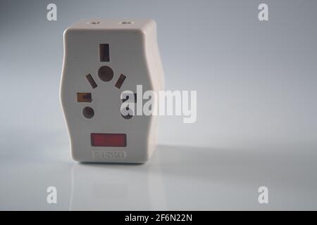 Close up of an electrical three way plug adapter Stock Photo