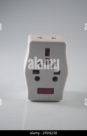 Close up of an electrical three way plug adapter Stock Photo