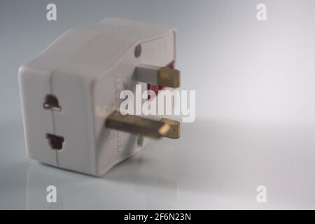 Close up of an electrical three way plug adapter Stock Photo