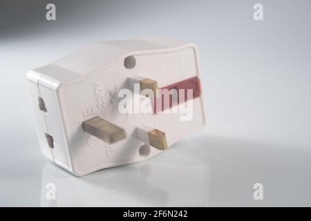 Close up of an electrical three way plug adapter Stock Photo