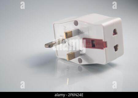 Close up of an electrical three way plug adapter Stock Photo
