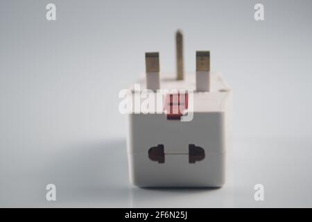 Close up of an electrical three way plug adapter Stock Photo