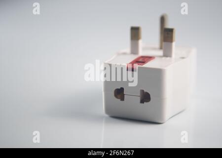 Close up of an electrical three way plug adapter Stock Photo