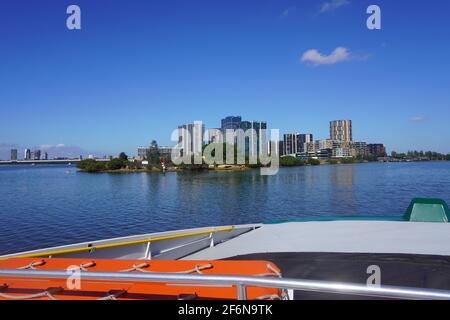 Ferry approaching Olympic Park Wharf on the Parramatta River Stock Photo