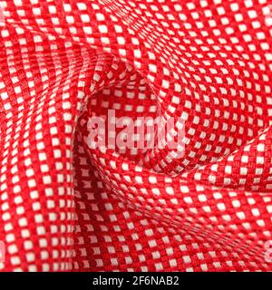 Texture, background, template. Silk other Cotton fabric white and red color, silk other Cotton drapery. In closeup, threads of fabric and a pattern of Stock Photo
