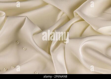 White silk fabric lines. High resolution background texture, decorative basis for design. Closeup of rippled Stock Photo