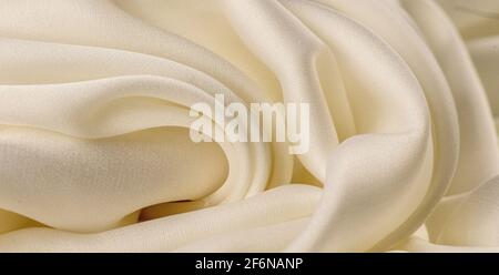 White silk fabric lines. High resolution background texture, decorative basis for design. Closeup of rippled Stock Photo