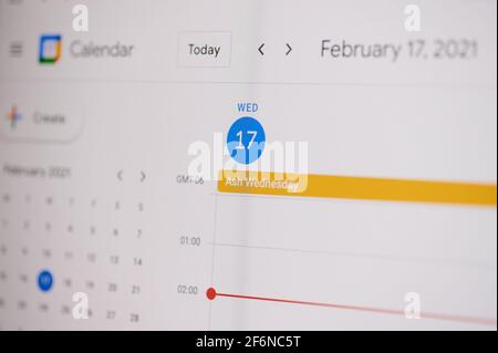 New york, USA - February 17, 2021: Ash Wednesday 17 of February on google calendar on laptop screen close up view. Stock Photo
