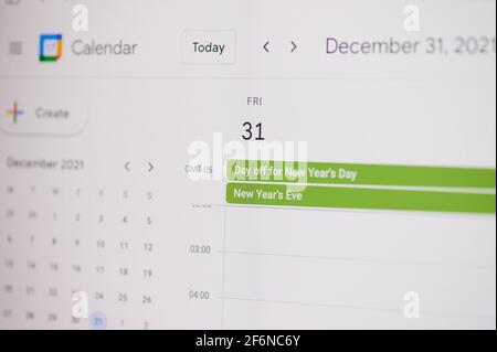 New york, USA - February 17, 2021: 31 New Year Eve 31 of December on google calendar on laptop screen close up view. Stock Photo