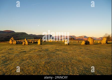 Castlerigg Stone Circle at sunrise, with a view to the mountains Stock Photo
