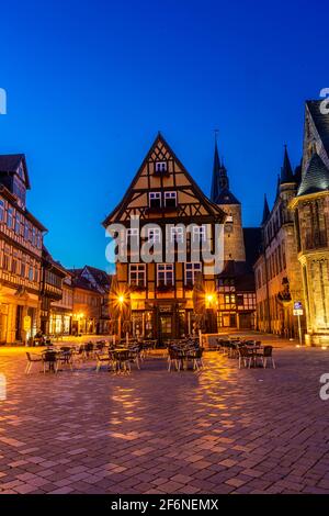 QUEDLINBURG, GERMANY, 28 JULY 2020: beautiful market square with half timbered houses at twilight QUEDLINBURG, GERMANY, 28 JULY 2020: beautiful market square with half timbered houses at twilight