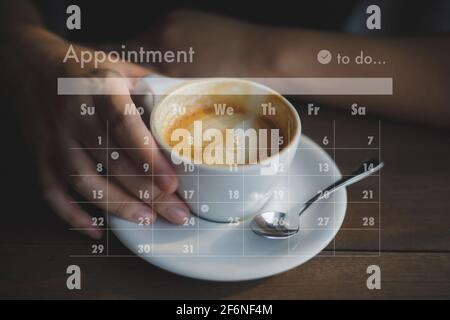 man work business writing working and schedule Calendar busy schedule tasks and appointments in Weekly Planner Schedule Stock Photo