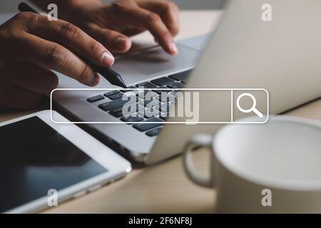 businessman using Searching Browsing Internet of things (IoT) internet network for Searching Browsing Internet Data Stock Photo