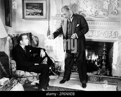 HUMPHREY BOGART and NIGEL BRUCE in THE TWO MRS. CARROLLS 1947 director PETER GODFREY original play Martin Vale gowns for Barbara Stanwyck by Edith Head producer Mark Hellinger Warner Bros. Stock Photo