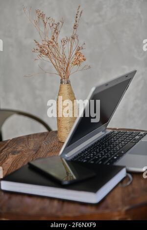 phone notebook computer lie on the table Stock Photo