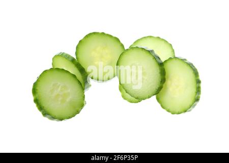 Ripe cucumber slices isolated on white background Stock Photo