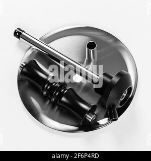 Disassembled stainless steel hookah on a white background. Stock Photo