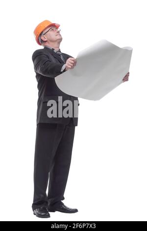 Confident architect wearing glasses looking at blueprints Stock Photo