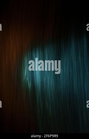 thin blue and bronze light lines on a black background Stock Photo