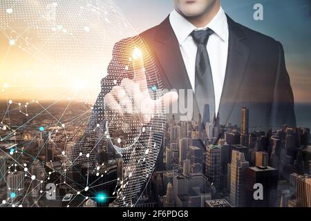 Businessman pointing on futuristic interface. Innovation technology internet and business concept. Abstract technology  background. Stock Photo