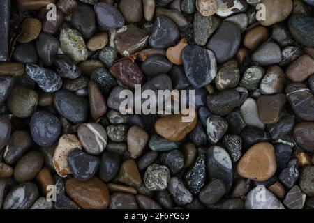 Pile sea gray stones. Background from sea gray stones. Stock Photo
