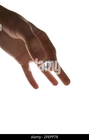 screw-nut in hands on a white background Stock Photo