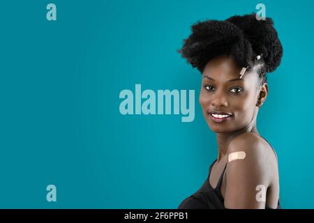 Showing Covid-19 Vaccination And Immunization. African American With Vaccine Stock Photo