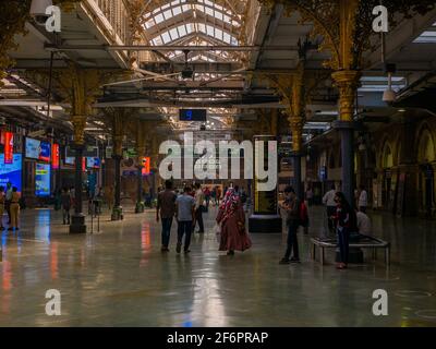 Mumbai, India - January 7, 2021 : Unidentified people inside one of the busiest station in Mumbai, Chhatrapati Shivaji Terminus. Relatively empty due Stock Photo