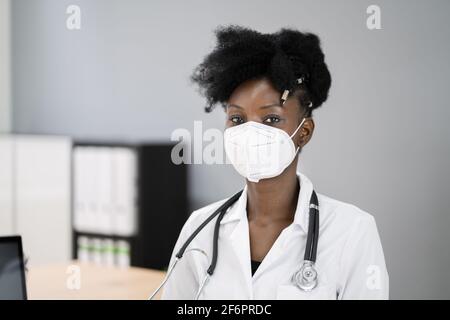 African American Man Doctor Wearing Medical Mask In Hospital Stock Photo