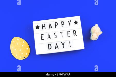 Holiday happy easter background, greeting card concept on blue background Stock Photo