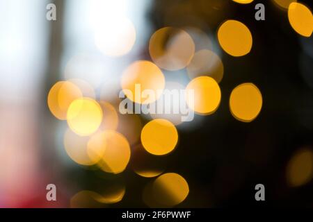 Abstract arrangement of diffused, soft focus Christmas Tree lights indoors Stock Photo
